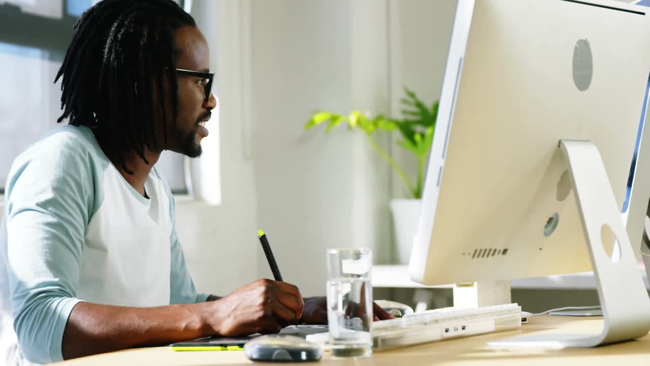 Graphic designer using graphics tablet