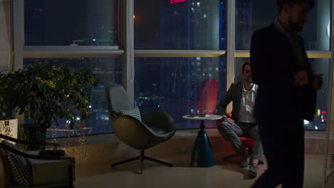 business meeting at night with city view