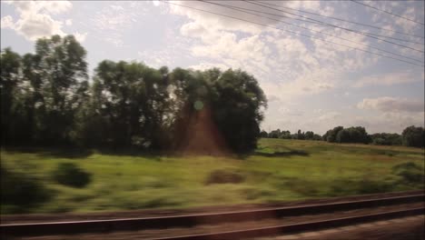 A-passenger-view-of-a-mainline-train-journey-in-England,-United-Kingdom,-from-Retford-to-King's-Cross-Station