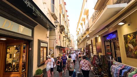 people walking in a busy shopping street