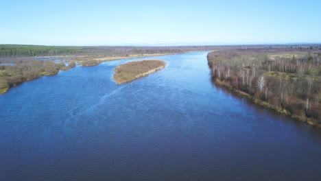 aerial view of a winding river and forest