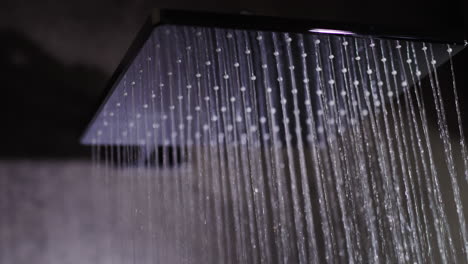 Jets-of-water-flow-from-the-square-shower-head.-Elite-plumbing-and-comfort