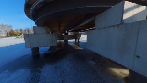 The-Bridge-Trapped-By-The-Ice-Of-A-Frozen-River-On-A-Sunny-Summer-Day