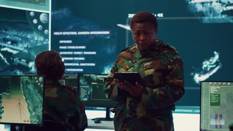 Woman-sergeant-major-working-on-deployment-of-electronic-warfare-tools