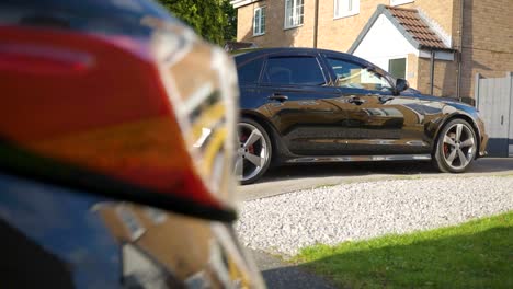 Shiny-black-car-after-a-full-detail