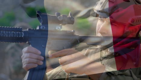 Animación-De-La-Bandera-De-Francia-Sobre-Un-Soldado-Caucásico-Sosteniendo-Un-Arma.