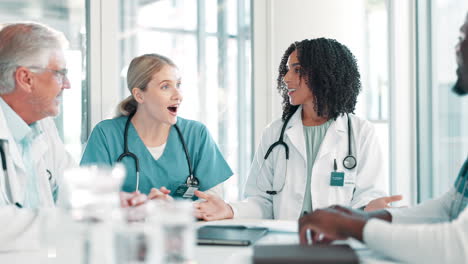medical team celebrates success in meeting