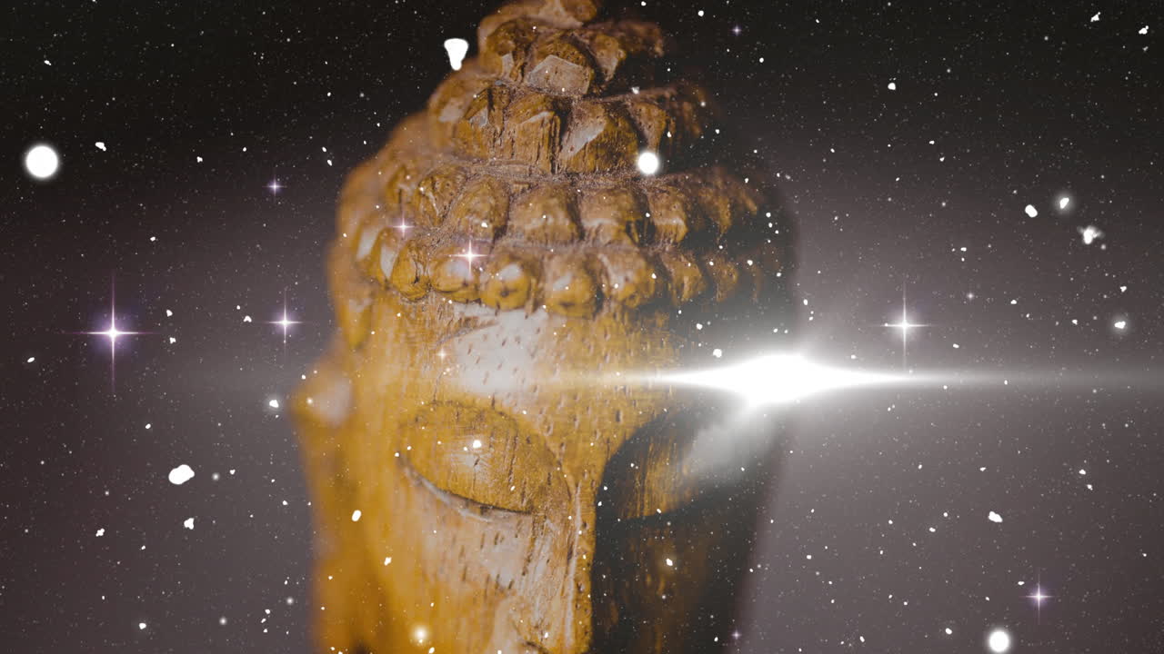 Buddha statue head with sparkling light and starry background animation