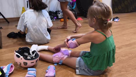 children preparing for roller skating session