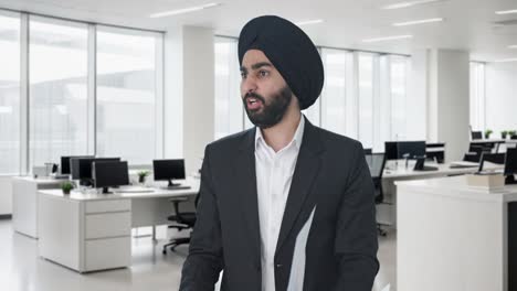 sikh indian businessman shouting on employees