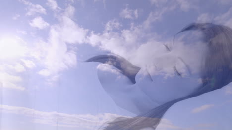 Dreaming-woman-with-closed-eyes-over-sky-and-clouds-animation