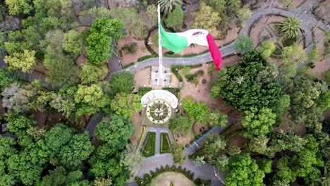 view of mexican flag in parque hundido, south mexico city