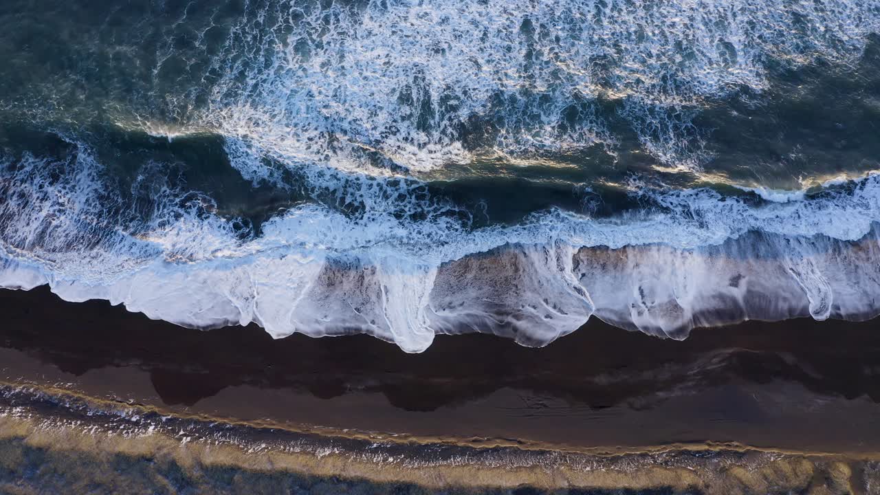Drone View Of South Coast Ocean With Black Sand And Waves - aerial ascending
