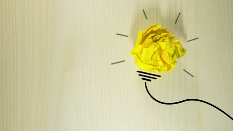 detener el movimiento de un papel amarillo arrugado y enrollado