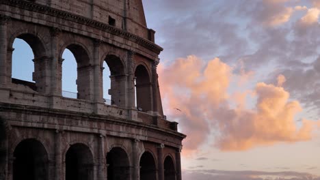 close shot outside view of the colosseum at sunset, rome, italy