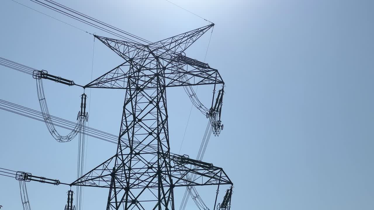 electricity pylon. or electrical towers is a tall structure that supports overhead power lines that carry high-voltage electricity over long distances