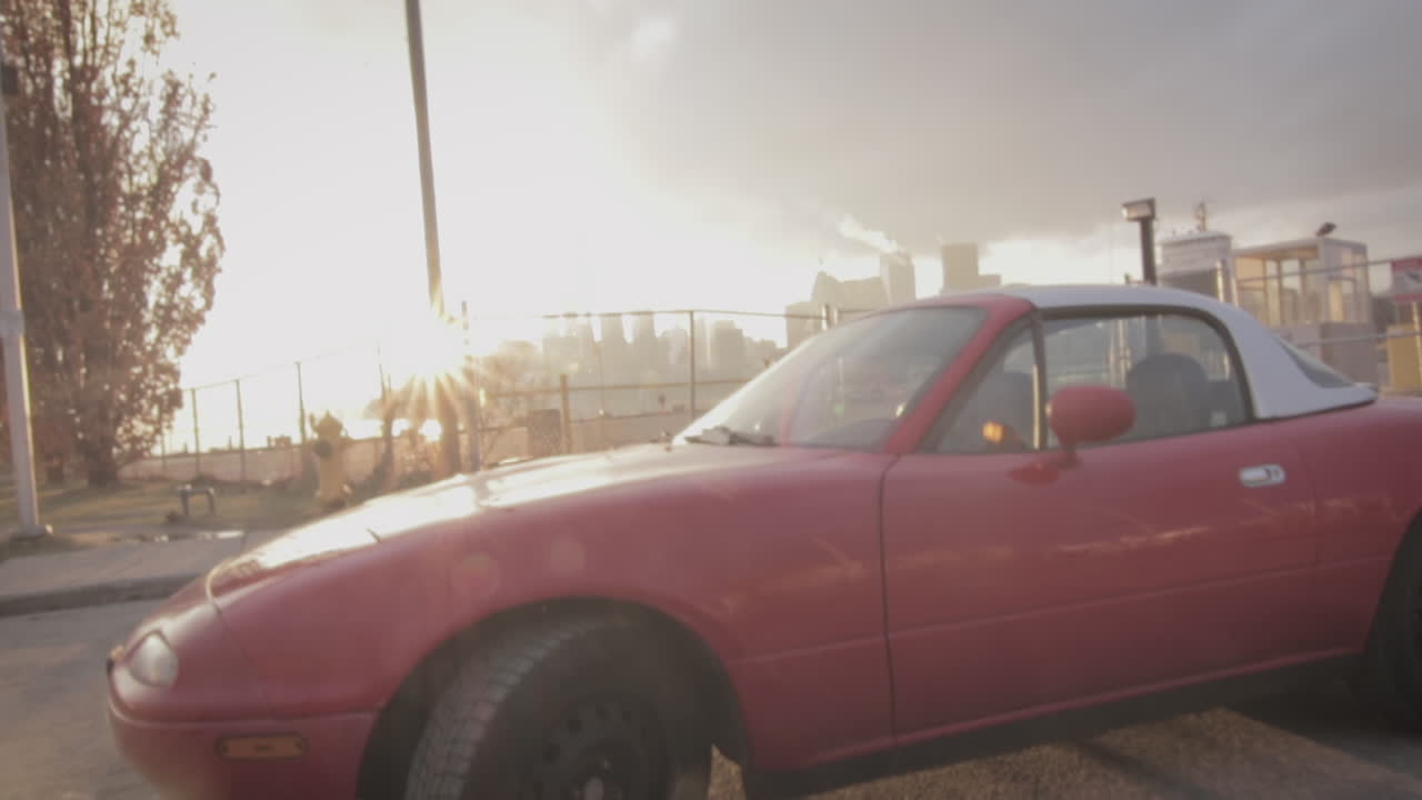 Red Mazda Miata at Sunset