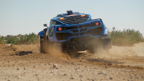 dakar rally cars racing on the dusty curve of desert