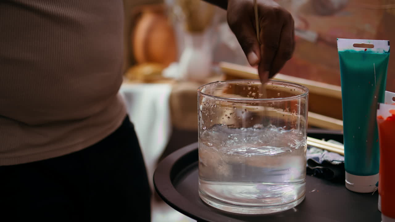 Artistic Setup with Water and Paint