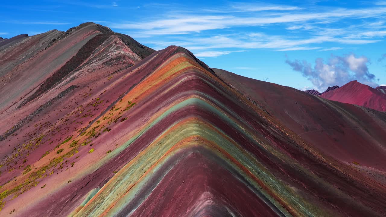 Rainbow Mountain Vinicunca seven colors siete colores montaña Peru Perú Time lapse morning blue skies clouds fog movement Red Valley Peruvian Andes Mountains rainy dry season nature landscape zoom out