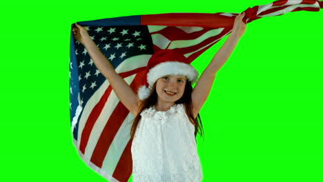 Festive-little-girl-with-usa-flag-in-slow-motion