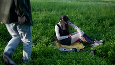 couple enjoying a picnic in a grassy field
