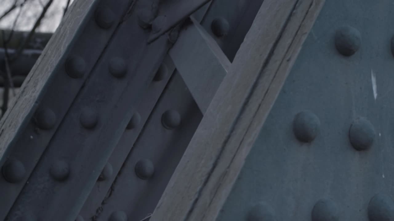 Close up of metal support girders on a bridge