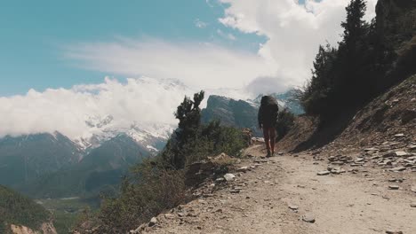 hiker walking on trekking trail in nepal