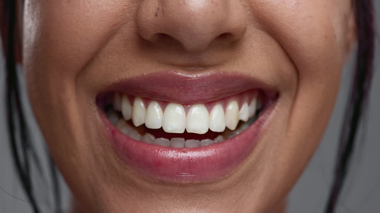 Woman, mouth and closeup in studio for dental