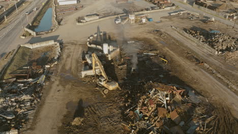 aerial shot of smoking equipment in junkyard in nashville, tn