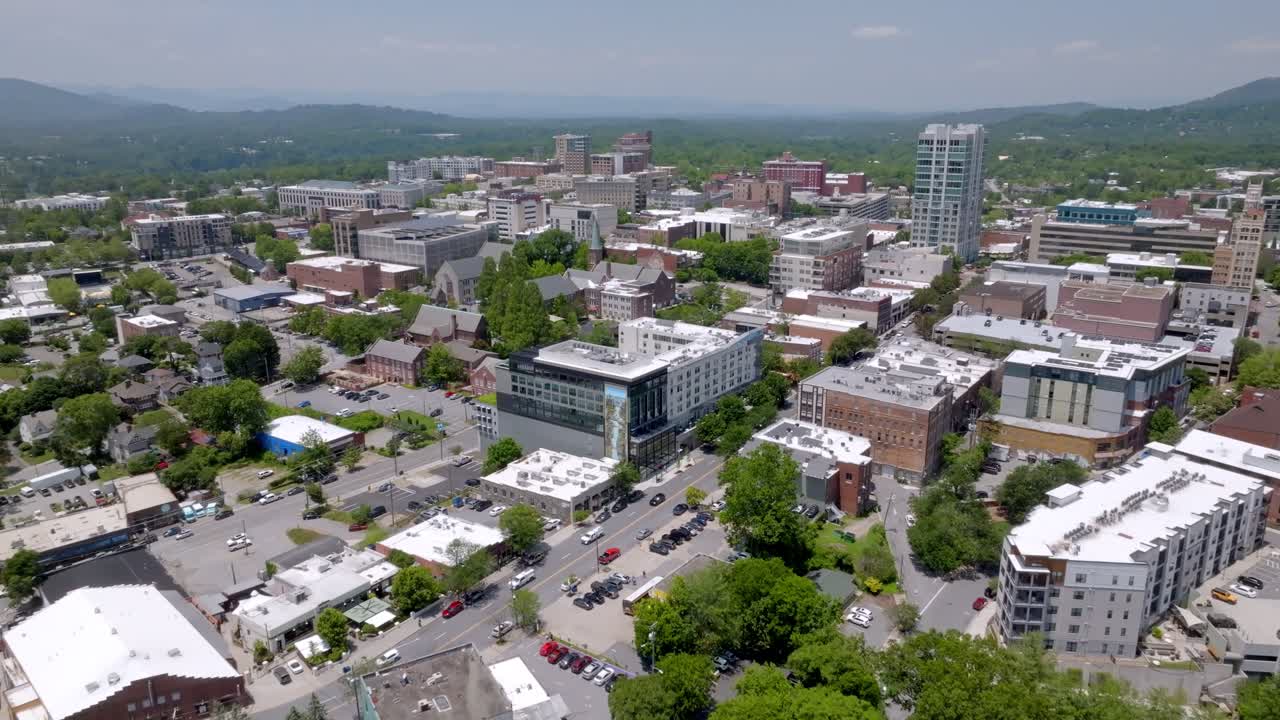 Downtown Asheville, North Carolina skyline with drone video moving in