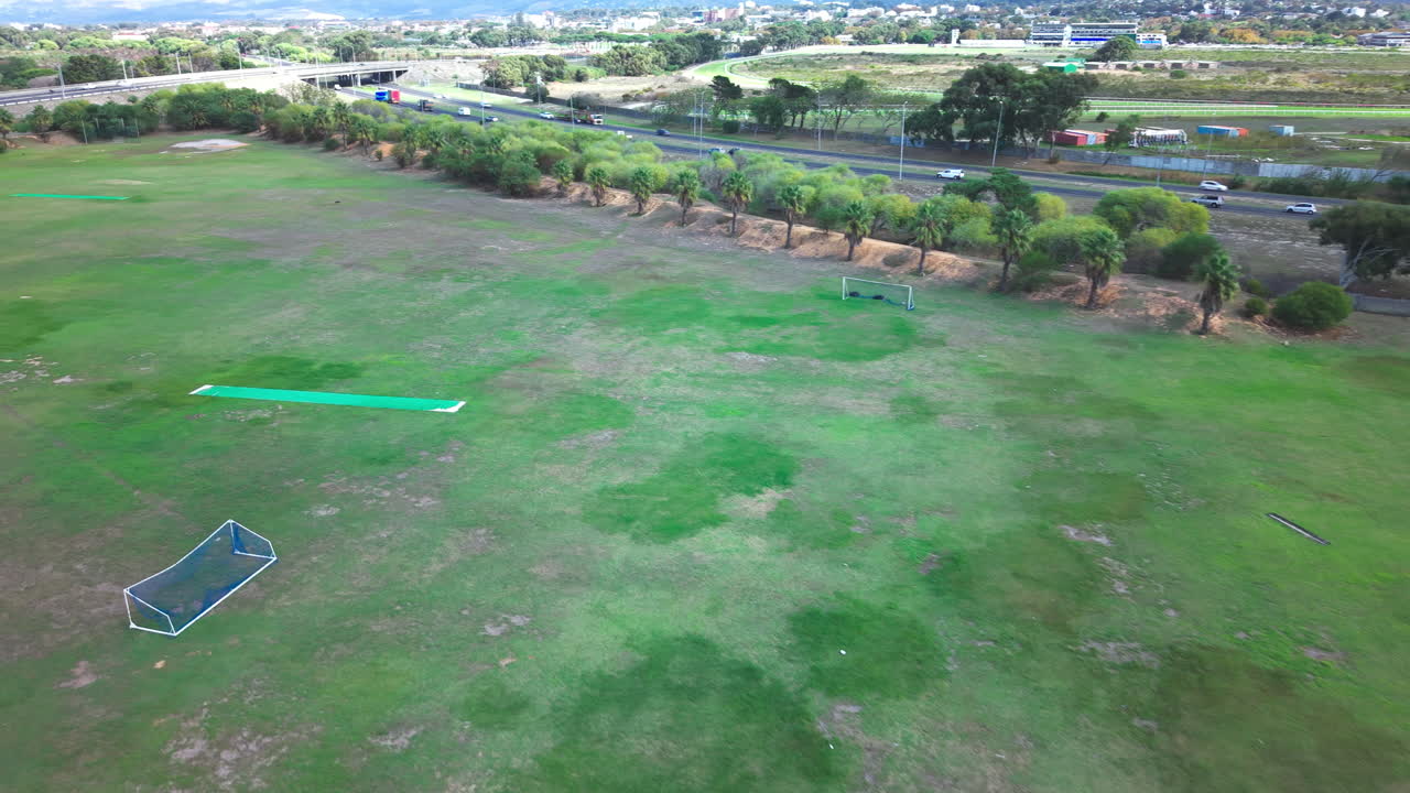 A green sports field outside of the suburbs of Cape Town. South Africa