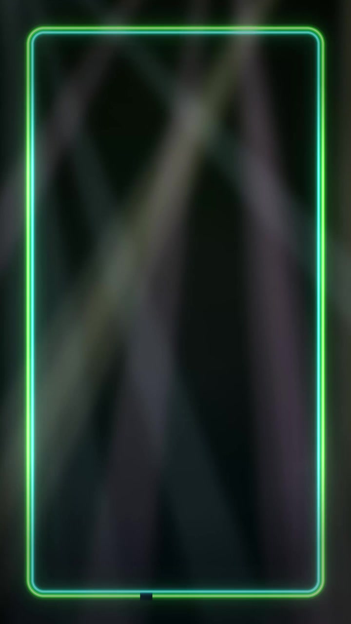 Glowing green rectangular border surrounds dynamic sweeping spotlights on a dark vertical stage background.