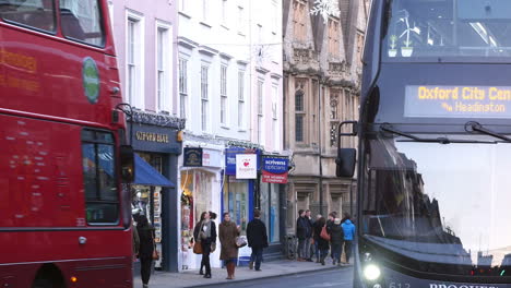 passengers getting off bus in oxford city centre