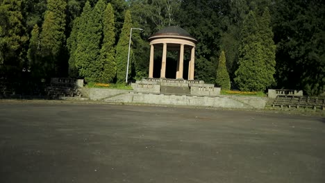 dynamic shot of historic structure in the middle of public park