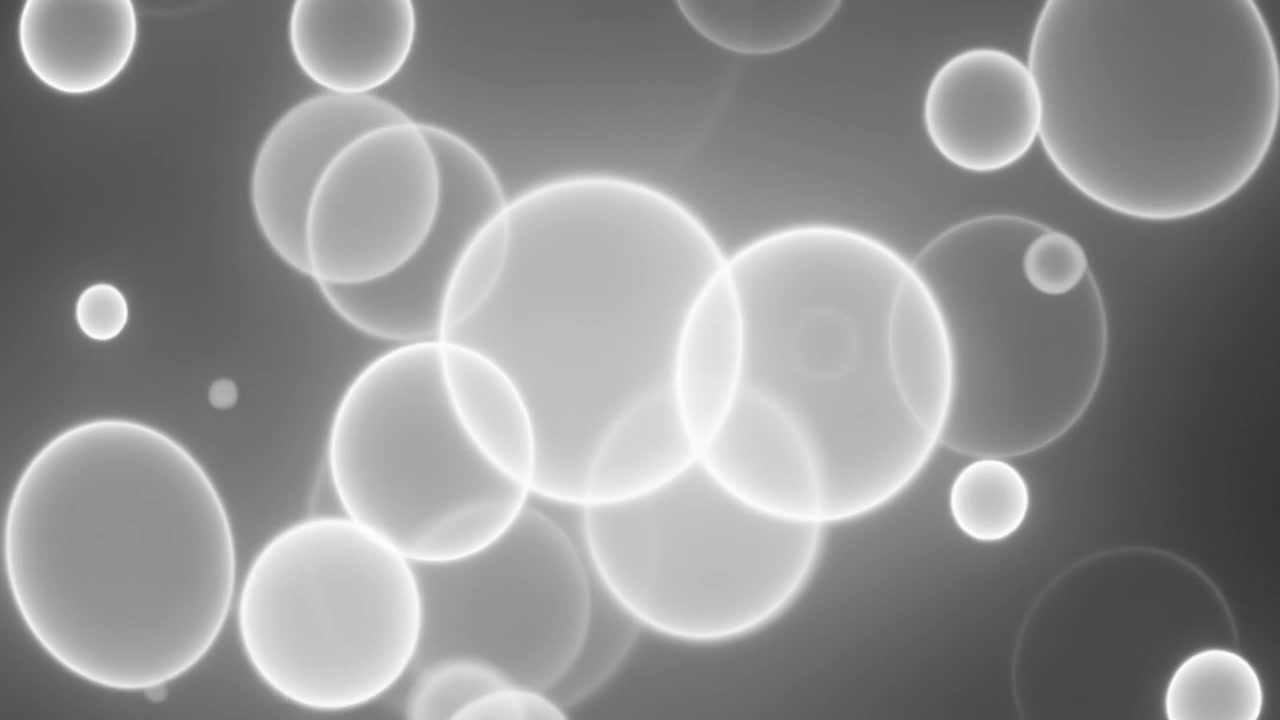 Sfondo astratto in movimento con cerchi bianchi luminosi fluttuanti.