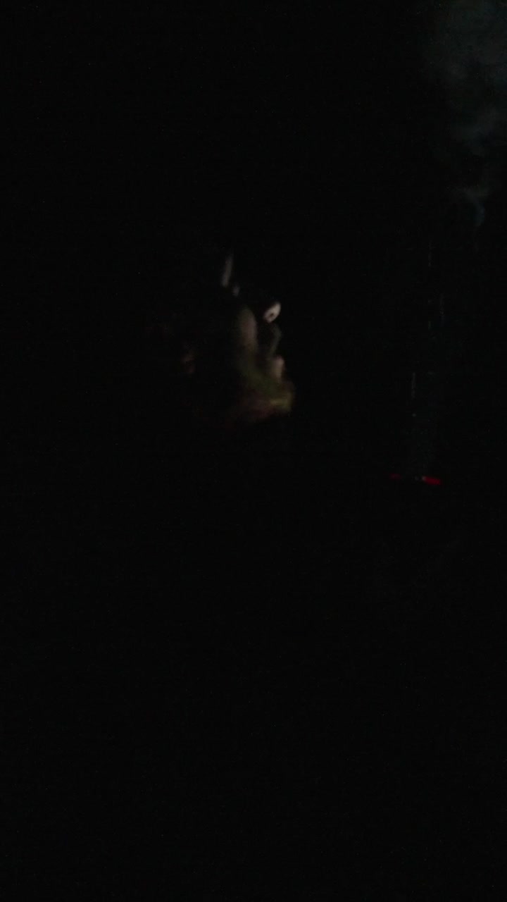 Figure in the Dark with a Light Source