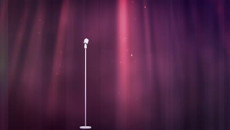 animation of spotlights and retro microphone in front of dark red theatre curtain