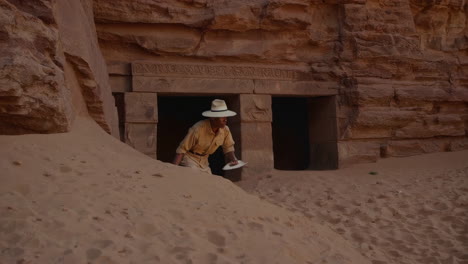 archaeologist exploring ancient ruins in the desert