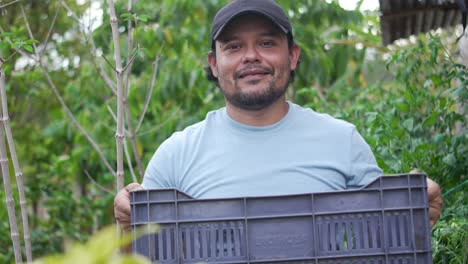 sustainable farming in rural honduras, latin farmer with basket of produce