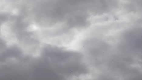 scenic dark rain clouds passing through the sky.