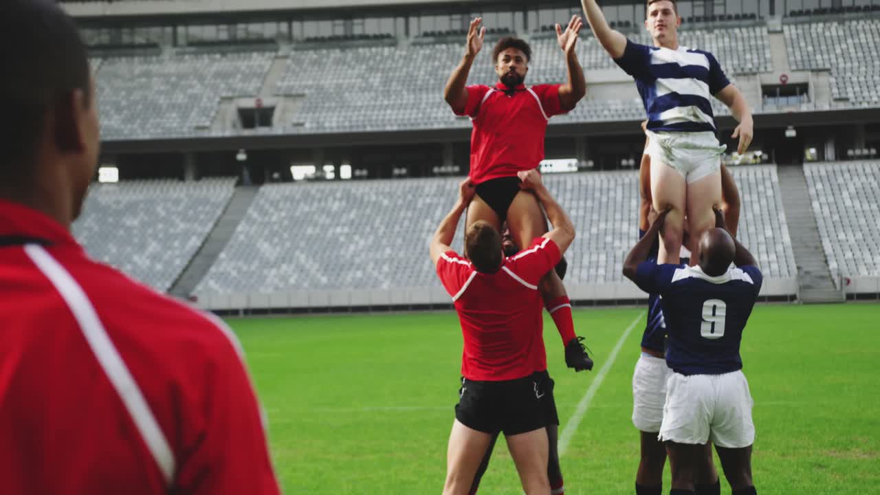 jugadores de rugby jugando un partido de rugby en el estadio 4k