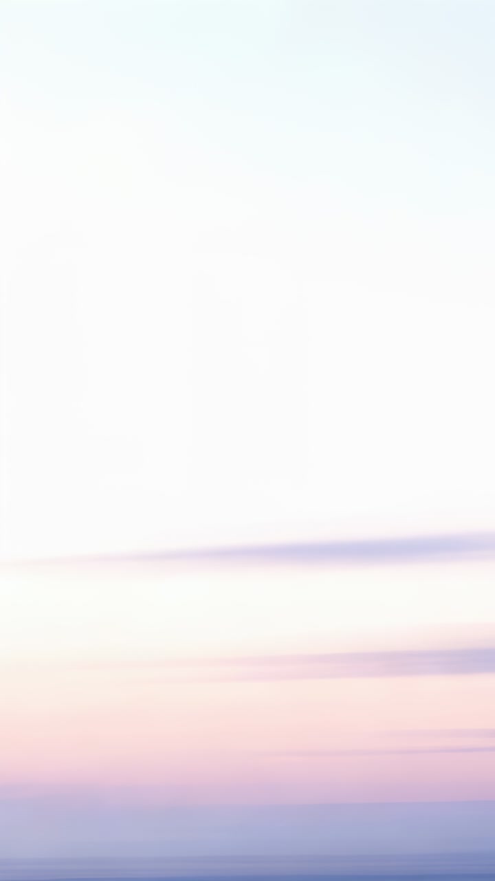 Vertical video: Shifting pastel sky changing during sunrise over low horizon, thin cloud bands