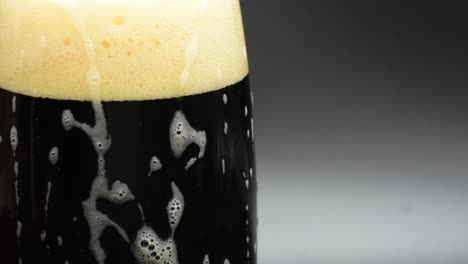 detail of a pint of black beer