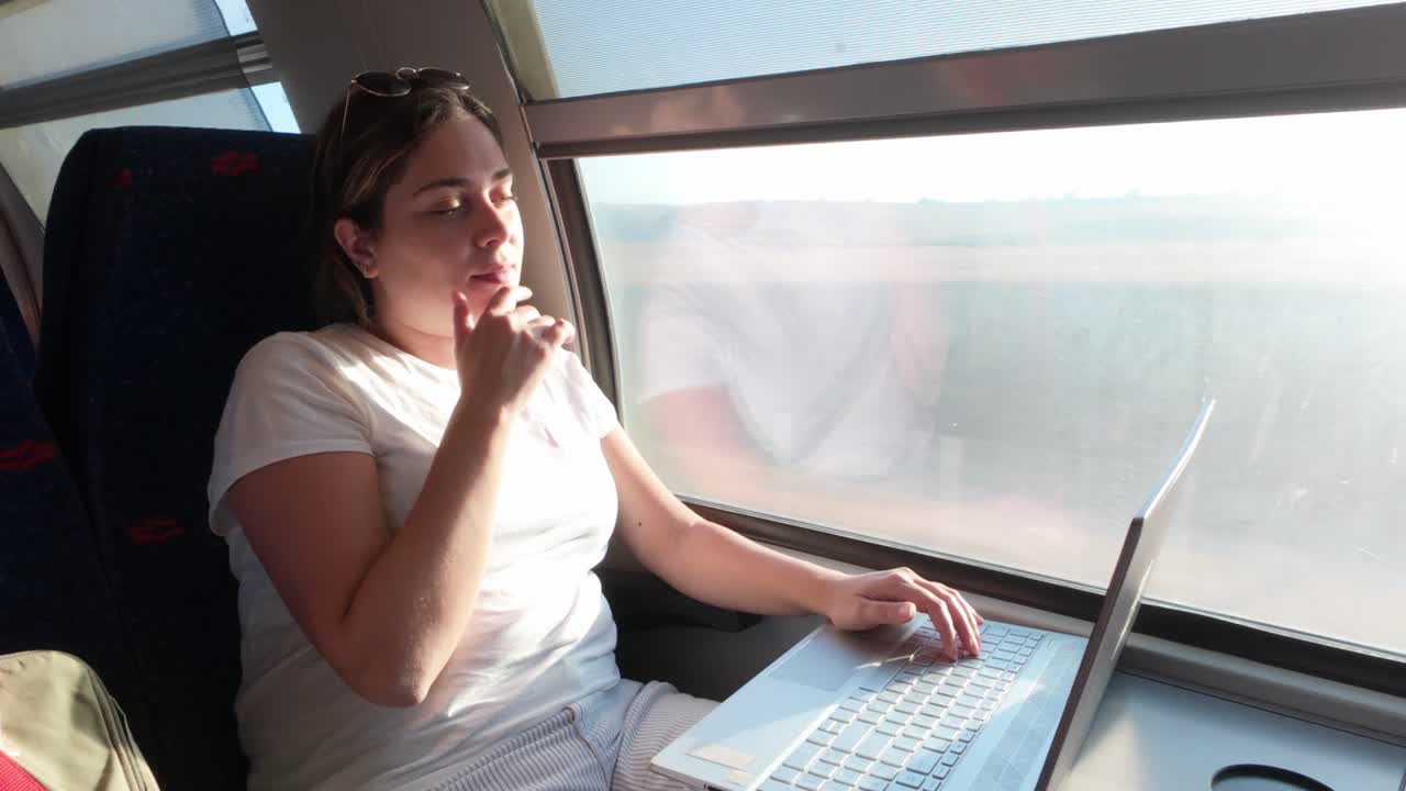 A Woman Working on Her Laptop Closes it After Finishing