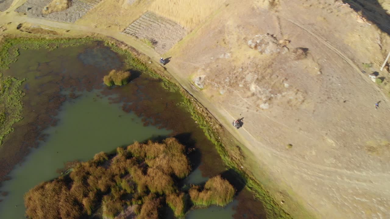Quads, road in the peruvian andes side to wilcacocha lake, anchas, huaraz, peru.