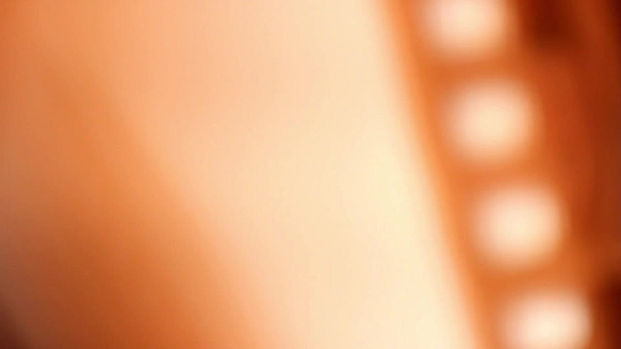 Close-up van Bewegende Filmstrip met Lichtreflectie