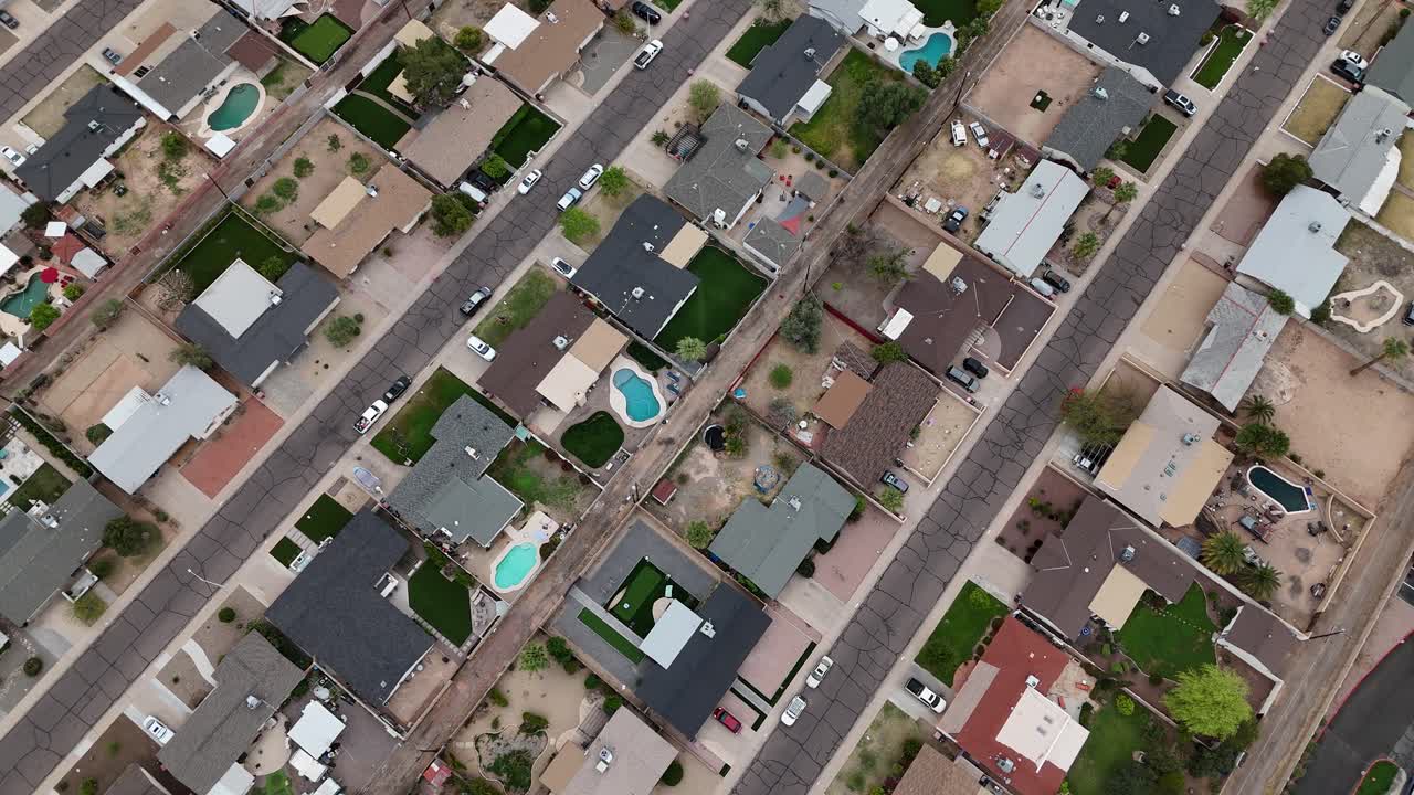 Drone Shot of Residential Neighborhood in Suburbs of Scottsdale, Arizona USA, Homes With Pools and Streets