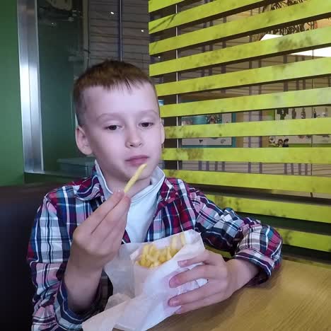 boy eating fast food