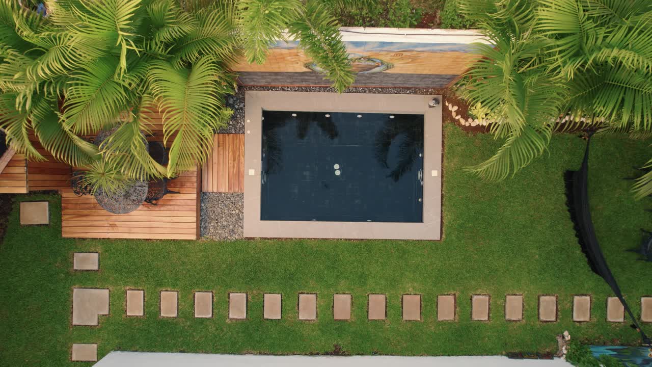 Premium stock video - Drone shot of swimming pool at the casa malca ...